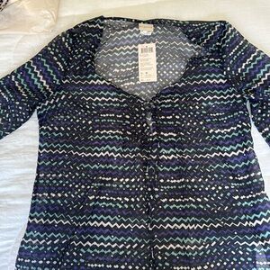 Garment, very lighted with tag on